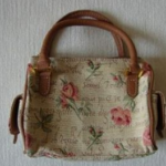 Bolso tapicería con asas